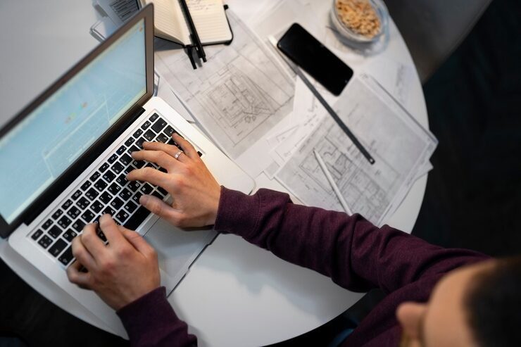 top-view-man-working-late-night_23-2150280992